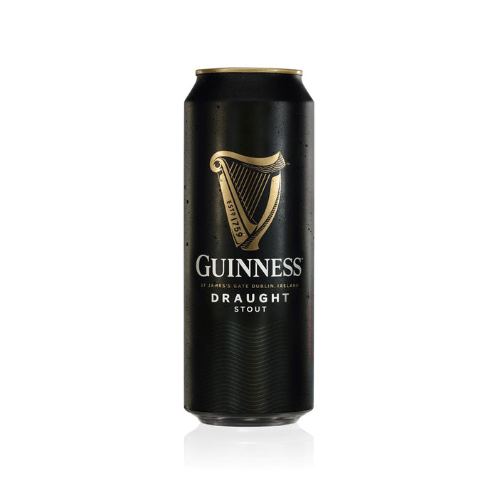 black can of Guinness Draught stout on a white background.