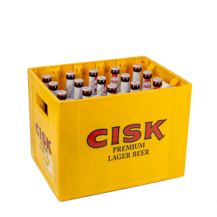 plastic case of 20 glass bottle SKoll Lager beers on white background