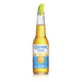 Corona Cero beer bottle with a lime wedge on a white background