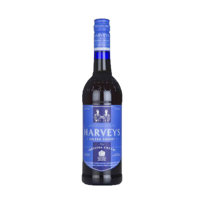 a bottle of Harvey's Cream Sherry on a white background