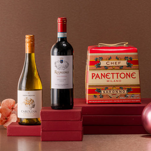 Christmas hamper with bottle of red wine, white wine and a Panettone