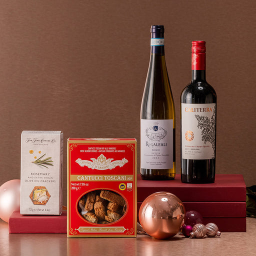 two bottles of wine with a box of italian cantucci and premium crakcers