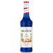 An image of a bottle of MONIN Blue Curaçao Syrup.