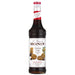 An image of a bottle of MONIN Chocolate Cookies Syrup.
