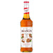 An image of a bottle of MONIN Cinnamon Roll Syrup
